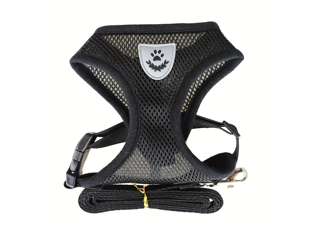All-black mesh step-in harness with a matching leash, laid flat