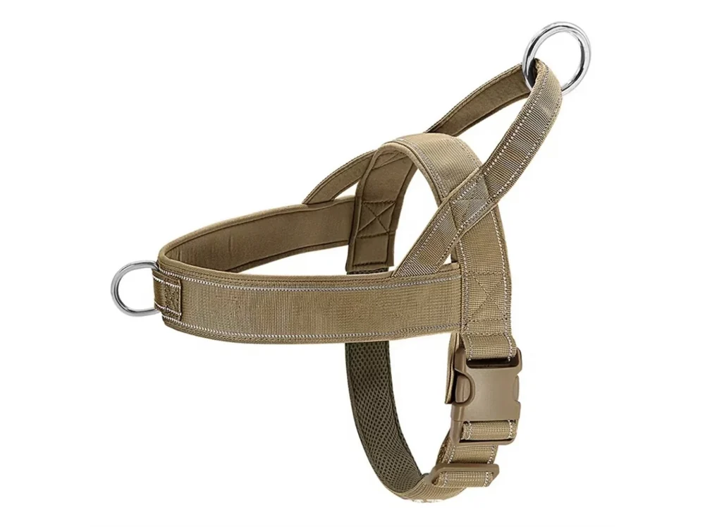 Khaki tactical harness with molle webbing and a padded grab handle, laid flat